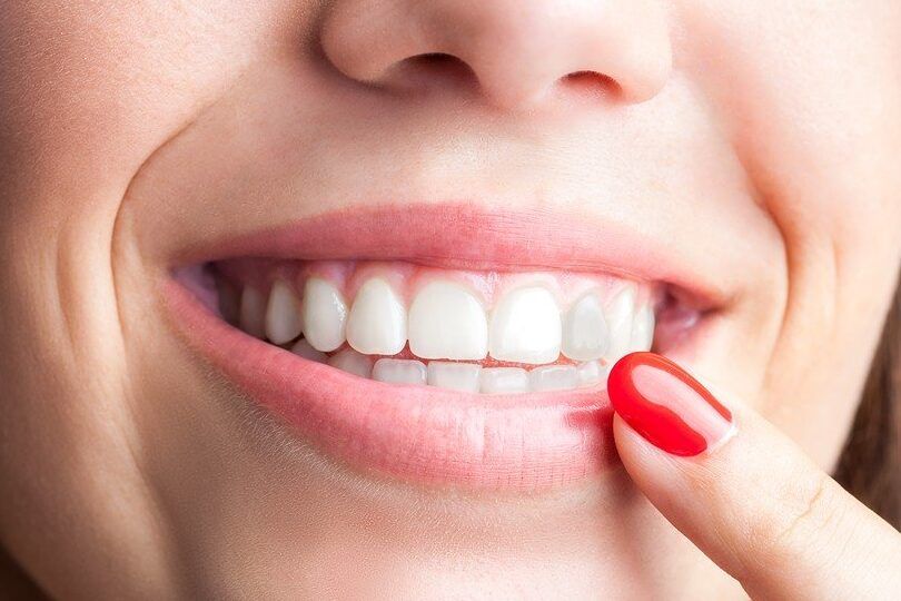 diente de leche gris