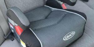 alzador en coche para ninos